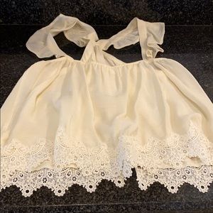 New cream sleeveless blouse by Mine Lace bottom